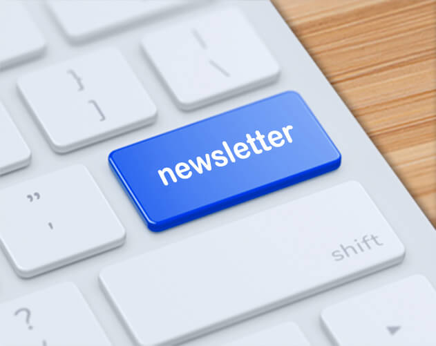 Keyboard with blue newsletter key among white keys