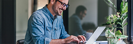 Man working at a laptop computer