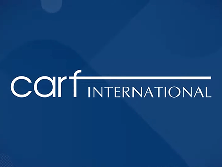 CARF International logo on solid blue background of Introduction to CARF video