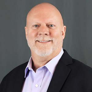 Headshot of Michael Johnson, senior managing director of Behavioral Health